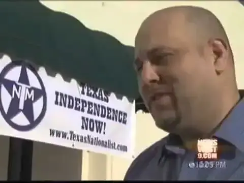Bald man interviewed on local TV beside a banner reading "Texas Independence Now!" with the TNM logo.