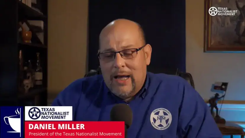 Daniel Miller speaks on a livestream, captioned as President of the Texas Nationalist Movement.