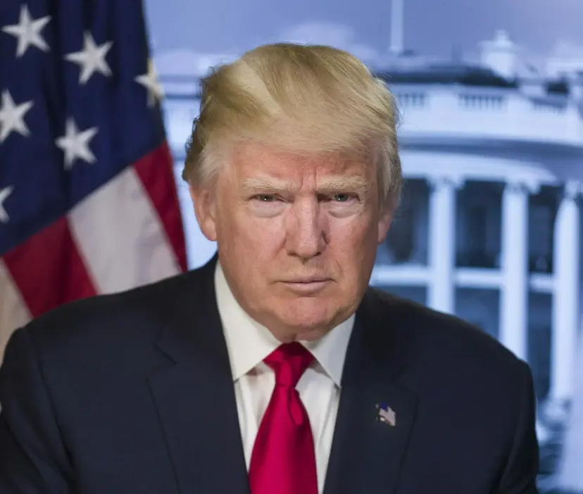 Official portrait of Donald Trump in a dark suit and red tie, with an American flag and White House behind.