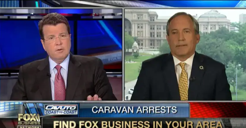 Fox Business split screen of Neil Cavuto and Ken Paxton under a banner reading "Caravan Arrests."
