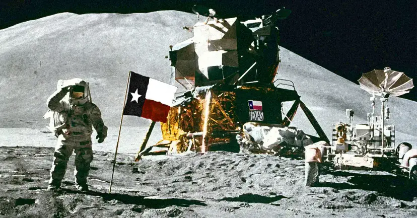 An astronaut saluting beside a lunar lander on the moon, edited to show a Texas flag and a Texas decal.