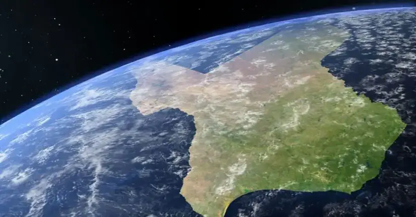 Satellite style view of Earth from space with the shape of Texas on the globe.