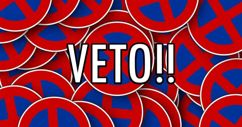 "Veto" banner.