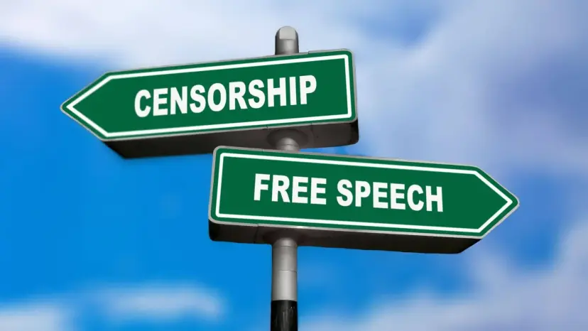 Street signs pointing opposite ways, one reading Censorship and the other reading Free Speech