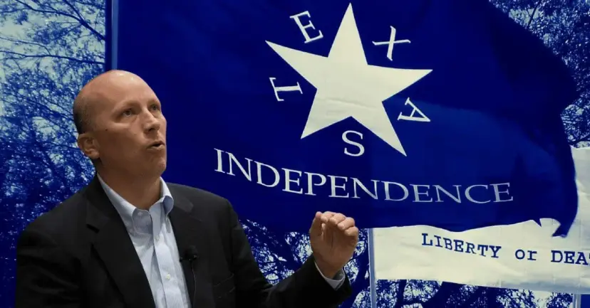 Congressman Chip Roy speaks and gestures in front of a blue Texas Independence flag.