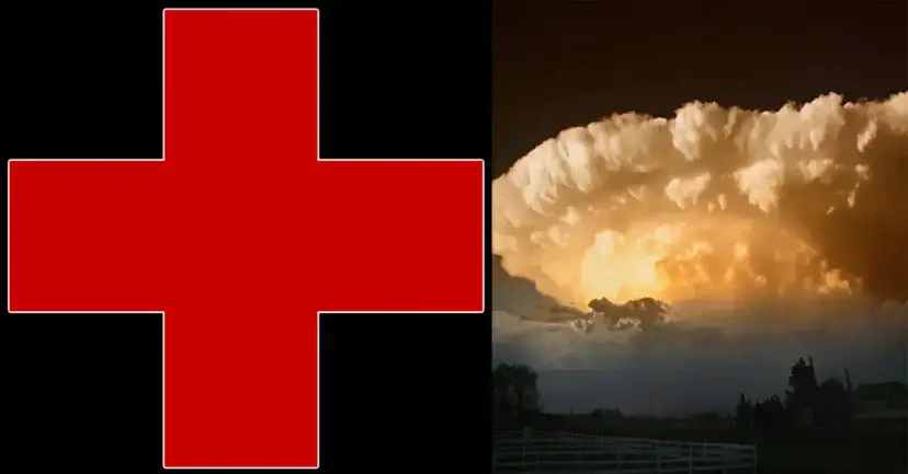 The Red Cross symbol beside a towering storm cloud glowing orange over a dark landscape.