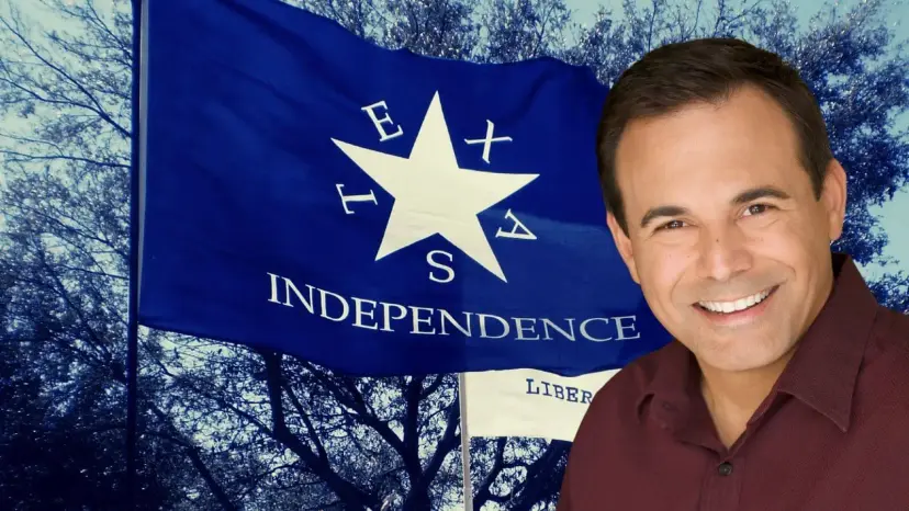Radio host Chris Salcedo smiles in front of a blue Texas Independence flag.