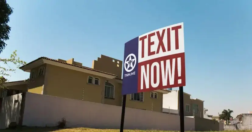 A 'TEXIT Now!' sign with the Texas Nationalist Movement logo stands in front of a stucco house.