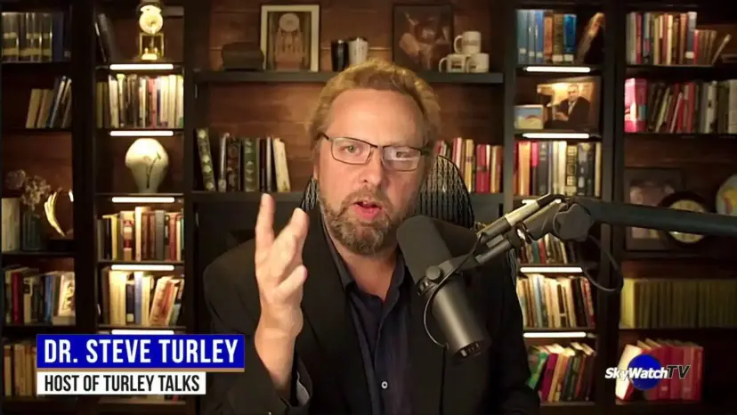 Dr. Steve Turley, host of Turley Talks, speaking into a microphone in front of bookshelves.