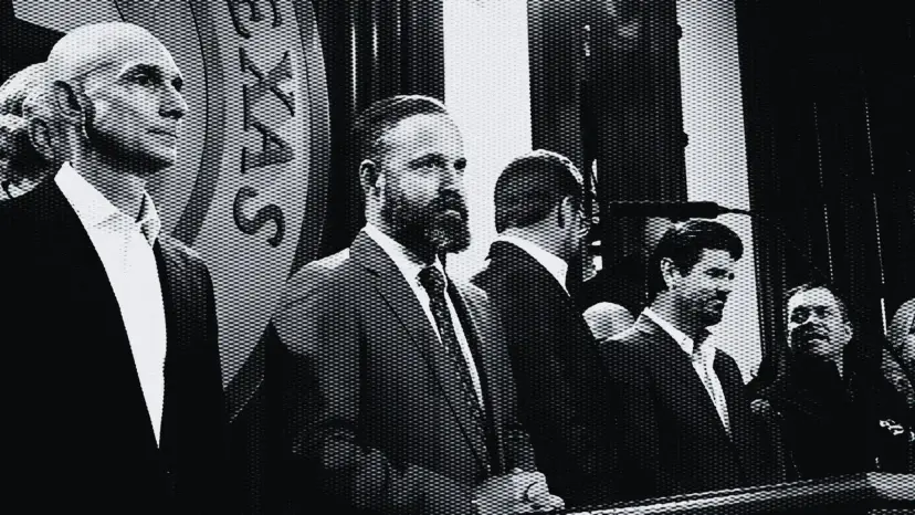Black and white halftone photo of men in suits standing at a podium in front of a large Texas seal.