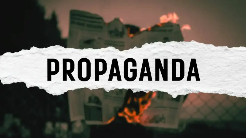 Torn paper strip reading 'Propaganda' laid over an image of burning newspapers.