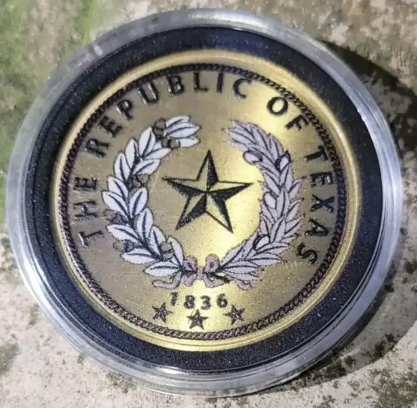 Back of a commemorative coin with a star inside a wreath, ringed by 'The Republic of Texas' and 1836.