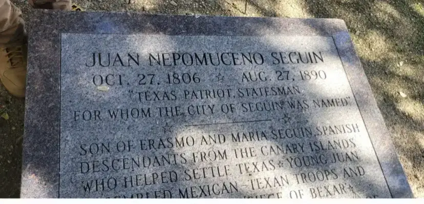 Granite grave marker inscribed 'Juan Nepomuceno Seguin, Oct. 27, 1806, Aug. 27, 1890, Texas Patriot, Statesman.'