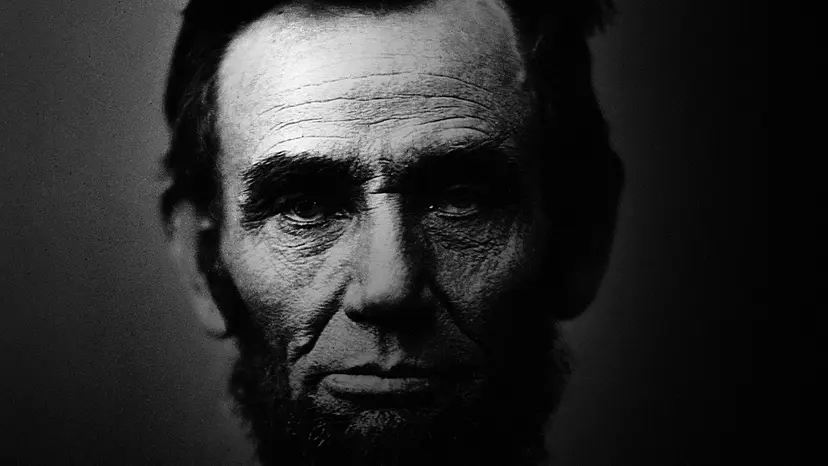 Abraham Lincoln, photographed by Alexander Gardner on November 8, 1863, half in shadow.