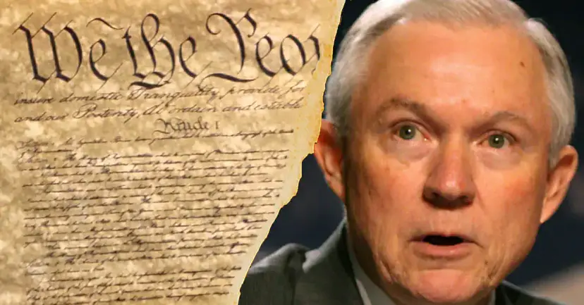 Jeff Sessions with a surprised expression beside the opening words of the U.S. Constitution.