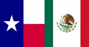 The Texas flag and the flag of Mexico side by side