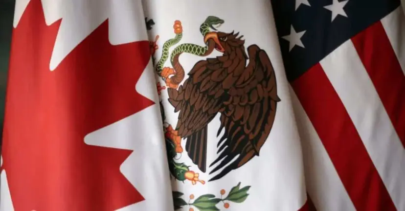 The flags of Canada, Mexico, and the United States draped side by side.