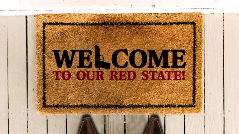 A doormat reading 'Welcome to our red state!' with a pistol forming the letter L.