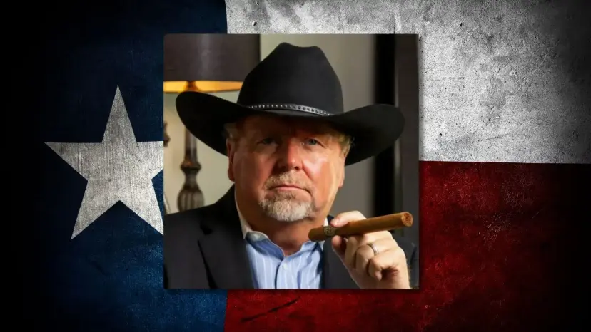 David Thomas Roberts in a black cowboy hat holding a cigar, set against a weathered Texas flag.