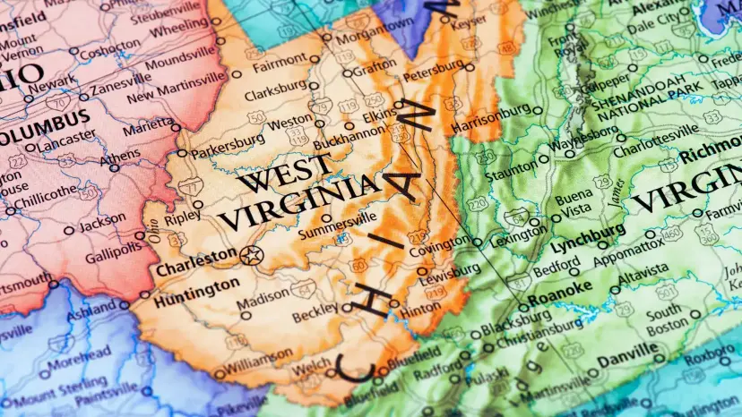 Close-up of a road map showing West Virginia, with neighboring Ohio, Virginia and the Appalachian Mountains.