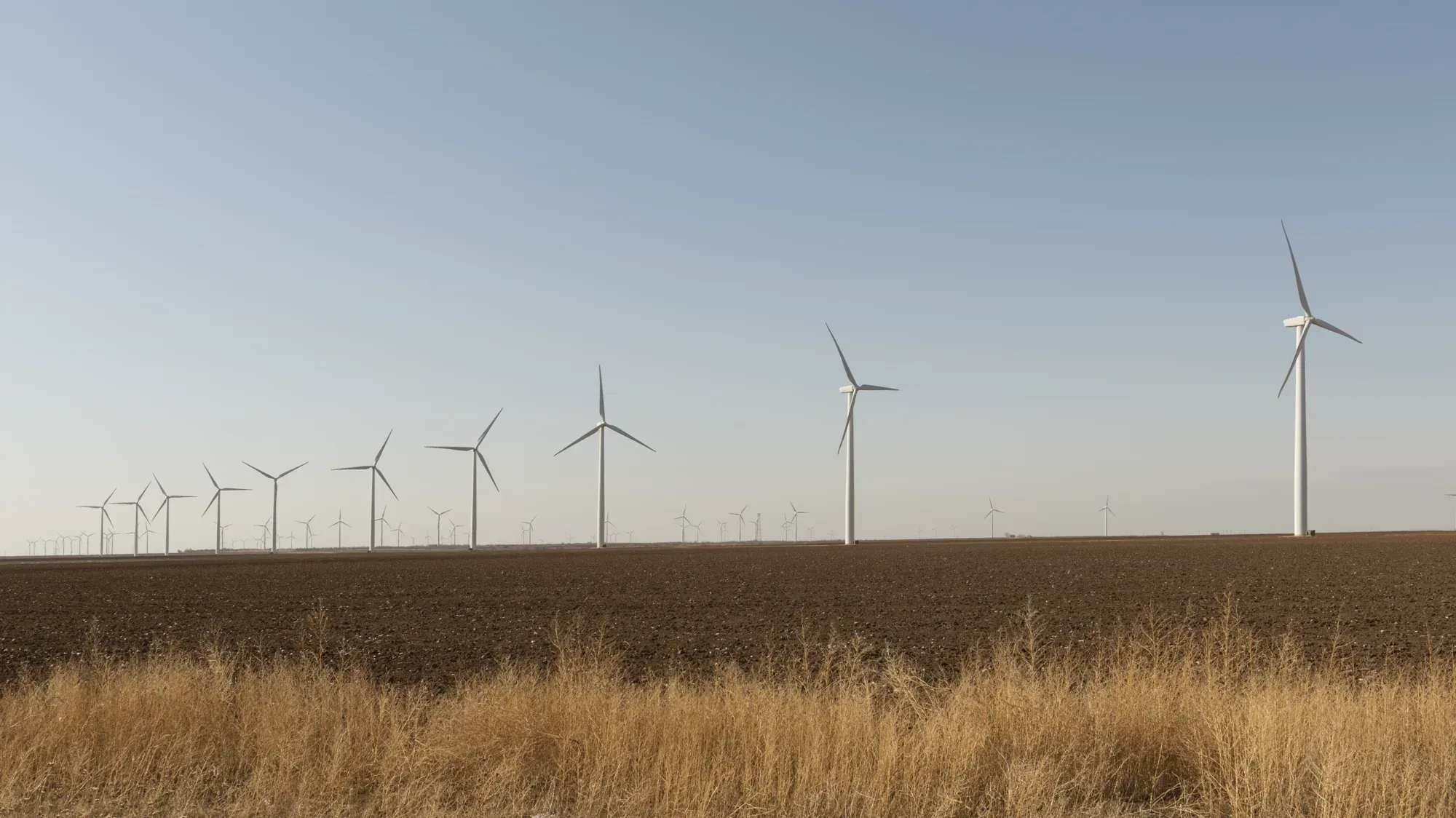 Wind turbines across a West Texas field