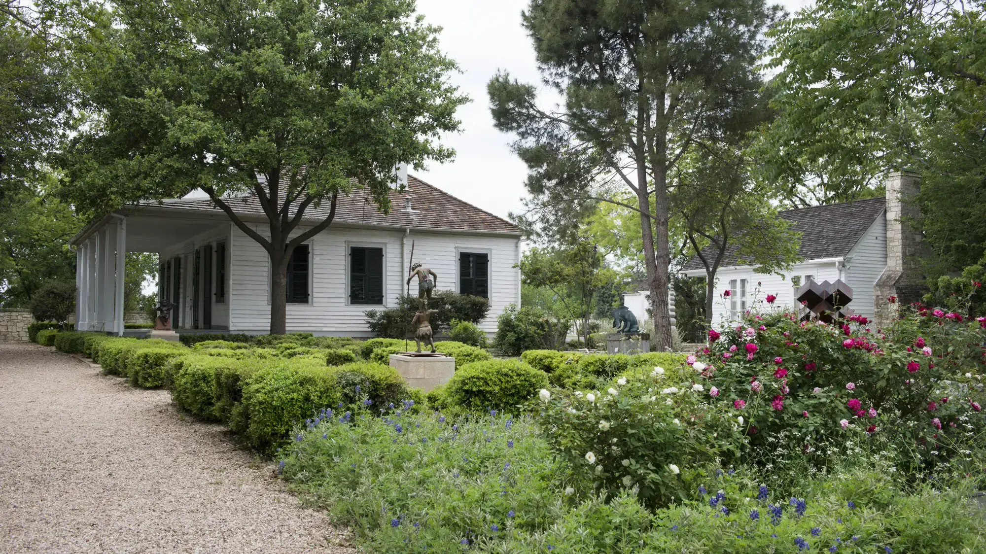The French Legation house in Austin among gardens and live oaks