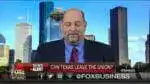 Daniel Miller on Fox Business in front of a city skyline, above a banner reading 'Can Texas Leave the Union?'