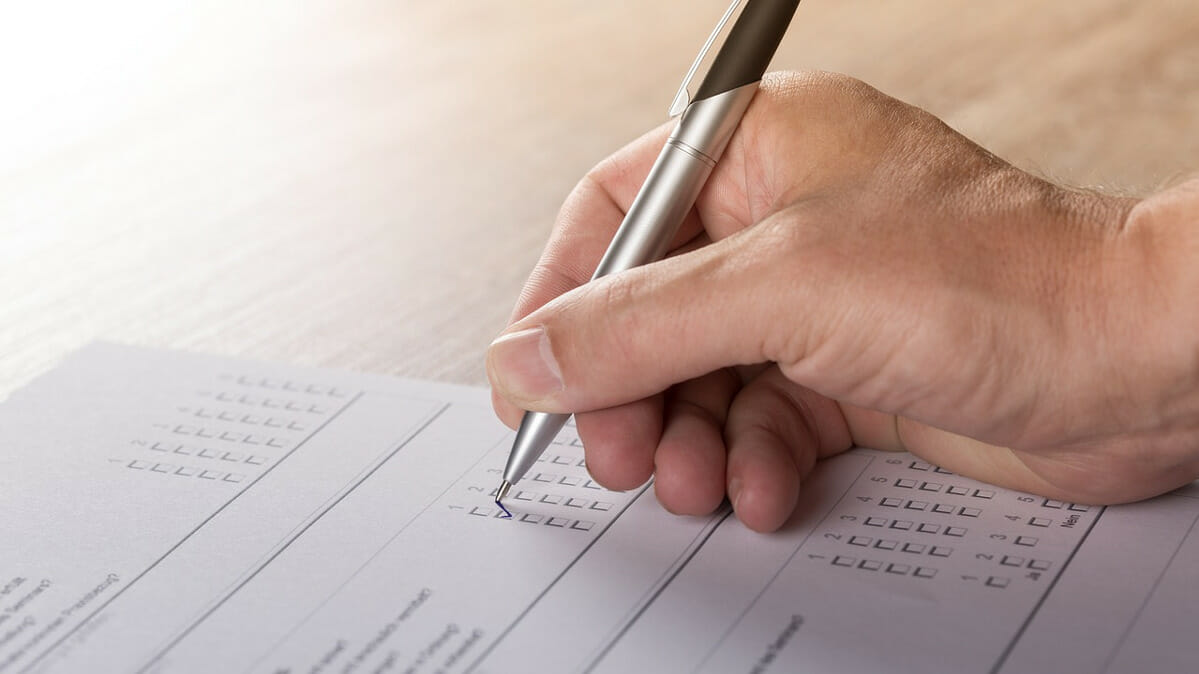 Hand recording written vote.