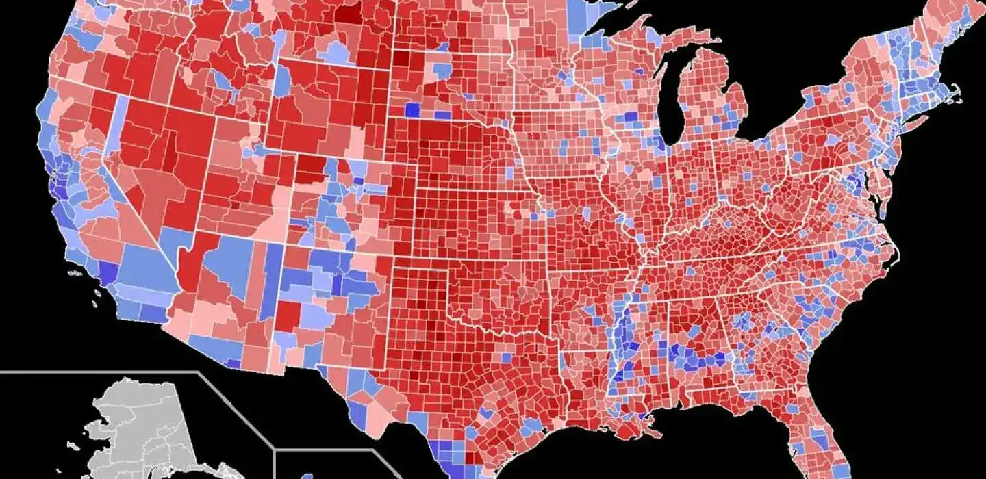 County-level map of the United States shaded red and blue, with most counties in red.