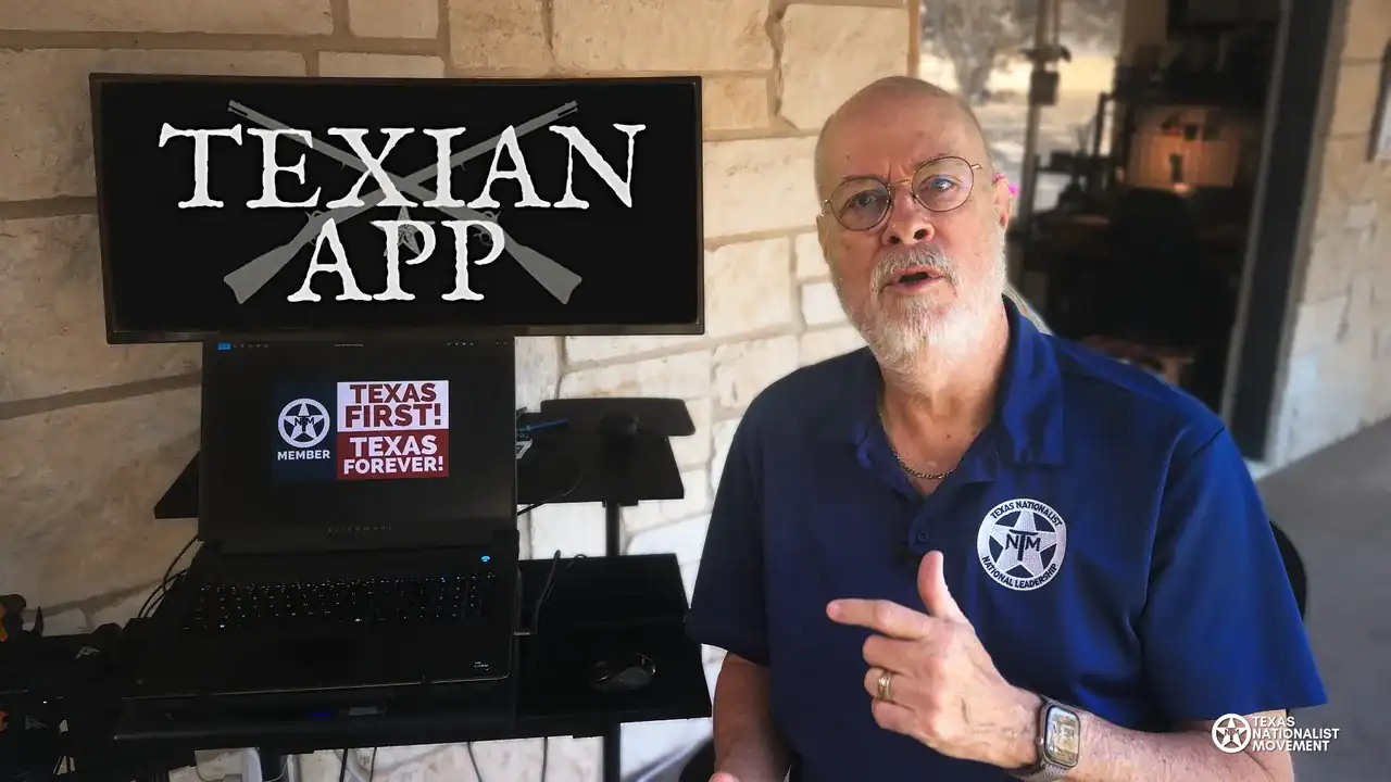 A bearded man in a TNM polo points to a monitor reading 'Texian App' and a laptop reading 'Texas First!'
